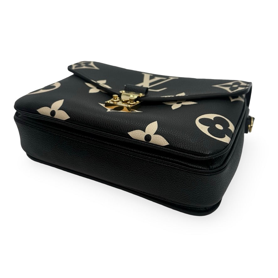 LOUIS VUITTON: Monogram Empreinte Bicolor Pochette Metis