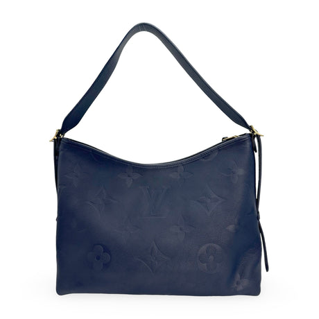 LOUIS VUITTON: Monogram Empreinte Carryall MM