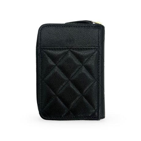 CHANEL: Quilted Caviar Vertical Zip Card Holder