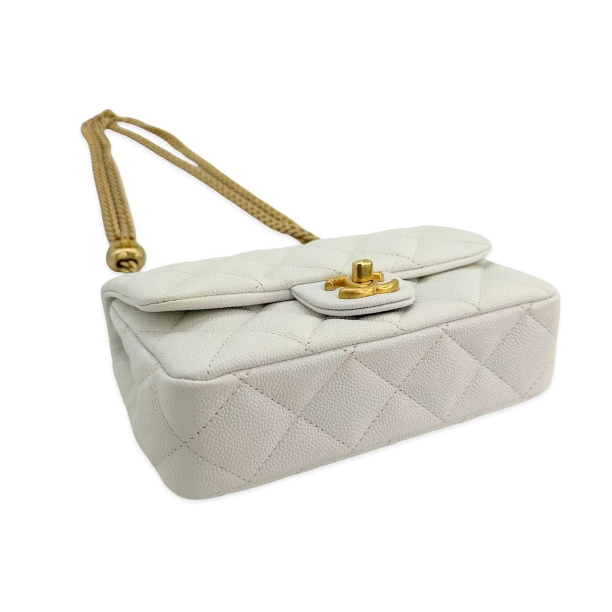 CHANEL: Quilted Caviar Sweetheart Mini Flap Bag