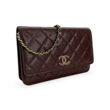 CHANEL: Quilted Caviar Woven Crystal Wallet on a Chain