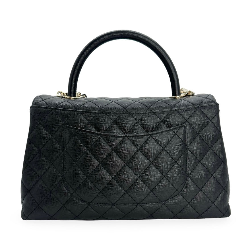 CHANEL: Quilted Caviar Small Coco Top Handle Flap Bag