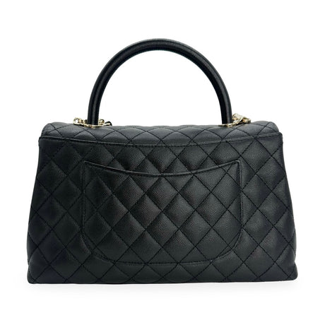 CHANEL: Quilted Caviar Small Coco Top Handle Flap Bag
