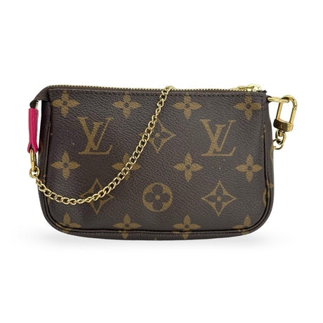 LOUIS VUITTON: Monogram Animation Mini Pochette Accessoires