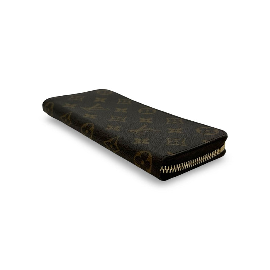 LOUIS VUITTON: Monogram Clemence Wallet