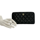 CHANEL: Quilted Caviar Large Gusset Zip Wallet