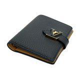 LOUIS VUITTON: Taurillon Capucines Vertical Compact Wallet