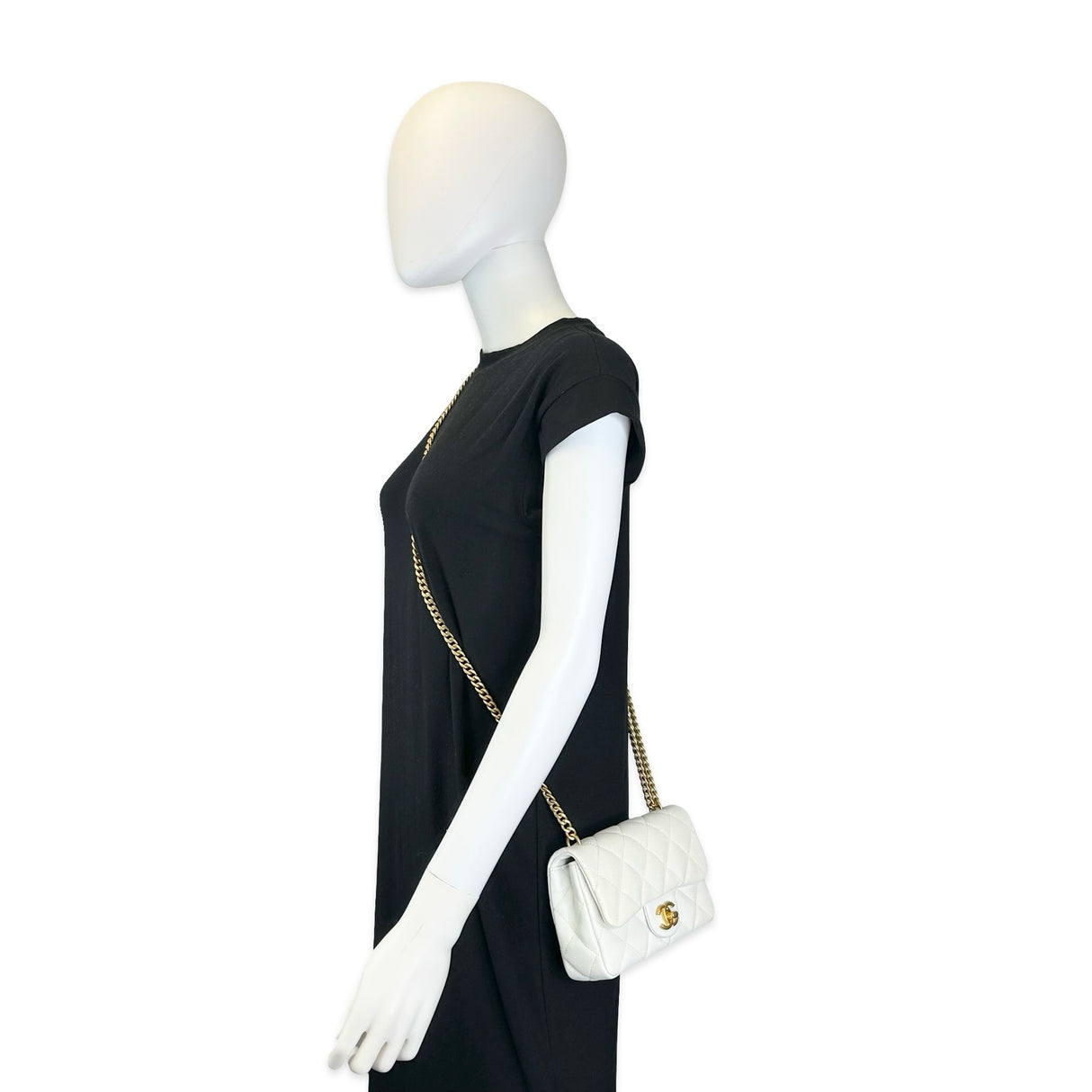 CHANEL: Quilted Caviar Sweetheart Mini Flap Bag