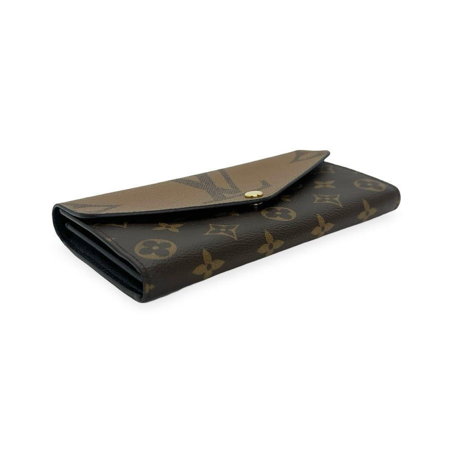 LOUIS VUITTON: Monogram Reverse Sarah Wallet