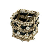 CHANEL: Leather Woven Chain and Pearl Bracelet