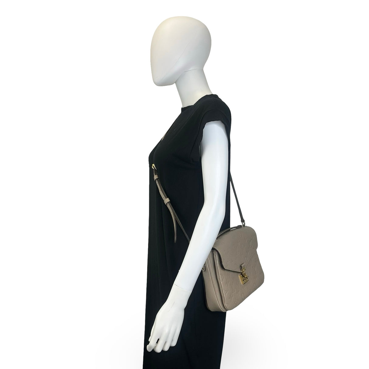 LOUIS VUITTON: Monogram Empreinte Pochette Metis