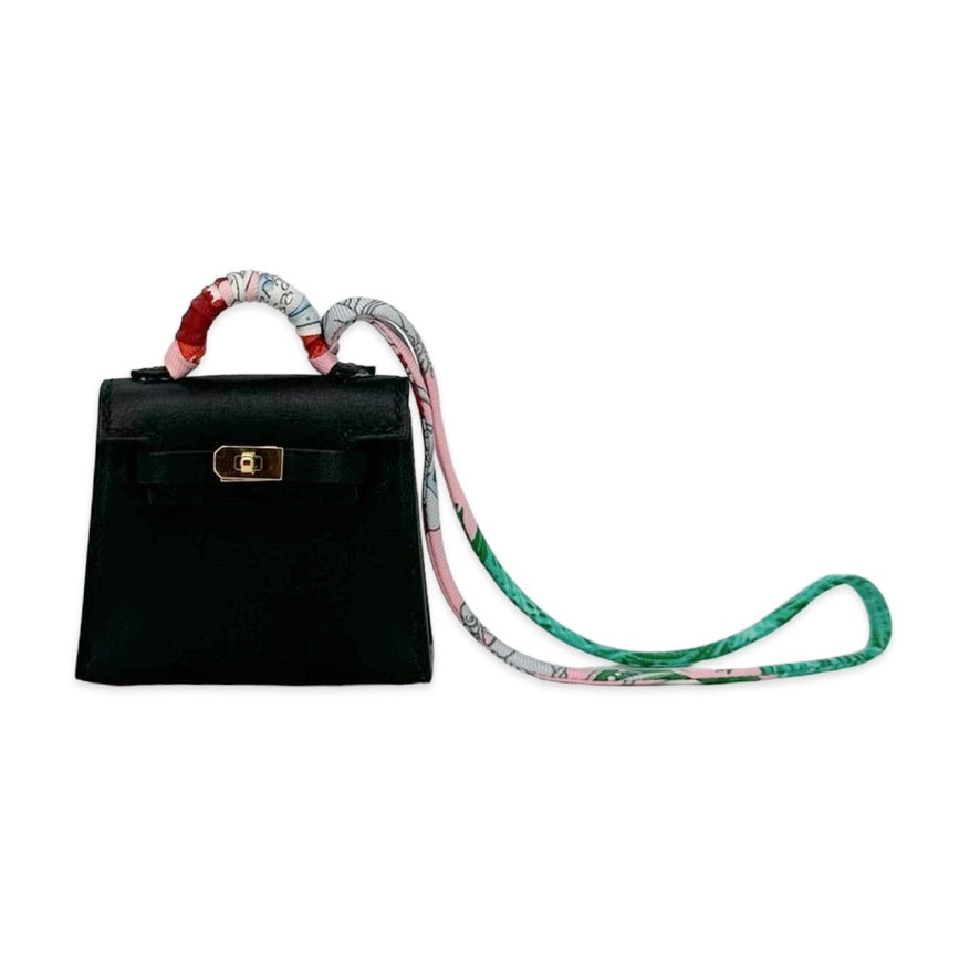 HERMES: Tadelakt Mini Kelly Twilly Bag Charm