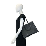 LOUIS VUITTON: Monogram Empreinte Onthego MM