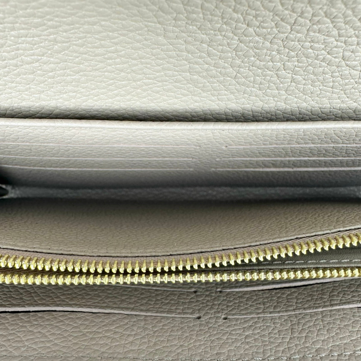 LOUIS VUITTON: Monogram Empreinte Sarah Wallet