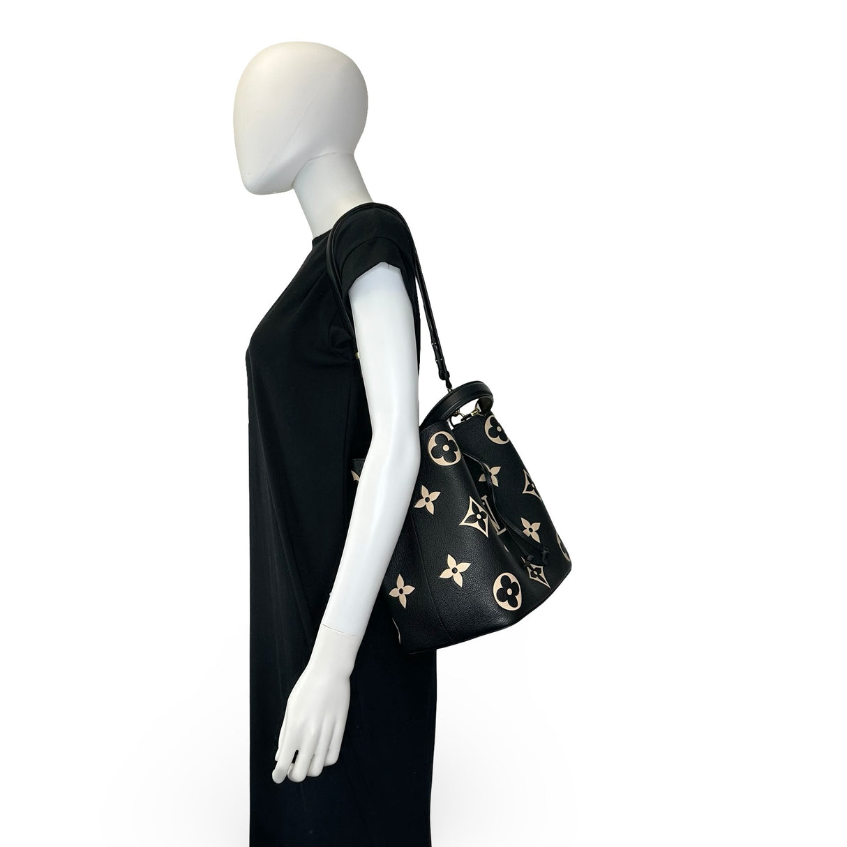 LOUIS VUITTON: Monogram Empreinte Bicolor NeoNoe MM