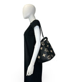 LOUIS VUITTON: Monogram Empreinte Bicolor NeoNoe MM