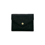 LOUIS VUITTON: Monogram Empreinte Victorine Wallet