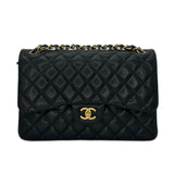 CHANEL: Quilted Caviar Jumbo Classic Double Flap