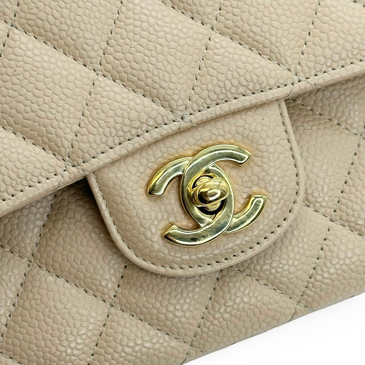 CHANEL: Quilted Caviar Medium Classic Double Flap