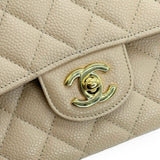 CHANEL: Quilted Caviar Medium Classic Double Flap