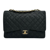 CHANEL: Quilted Caviar Maxi Classic Double Flap