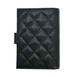 CHANEL: Quilted Caviar Classic Passport Holder Wallet