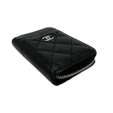 CHANEL: Quilted Caviar Vertical Zip Card Holder Wallet