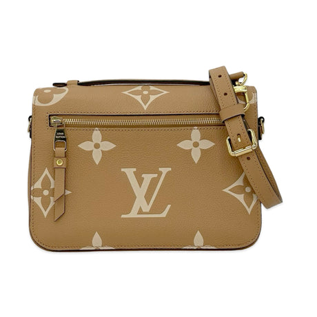 LOUIS VUITTON: Monogram Empreinte Bicolor Pochette Metis