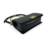 CHANEL: Quilted Caviar Old Medium Boy Bag