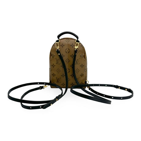LOUIS VUITTON: Monogram Reverse Mini Palm Springs Convertible Backpack
