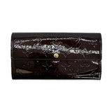 LOUIS VUITTON: Monogram Vernis Sarah Wallet