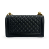 CHANEL: Quilted Caviar Old Medium Boy Bag