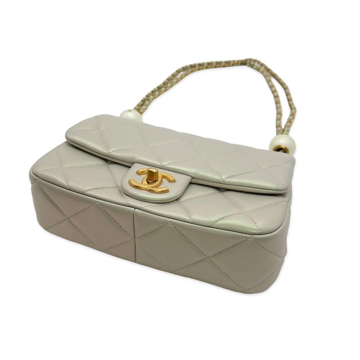CHANEL: Quilted Lambskin Pearly Small Flap Bag