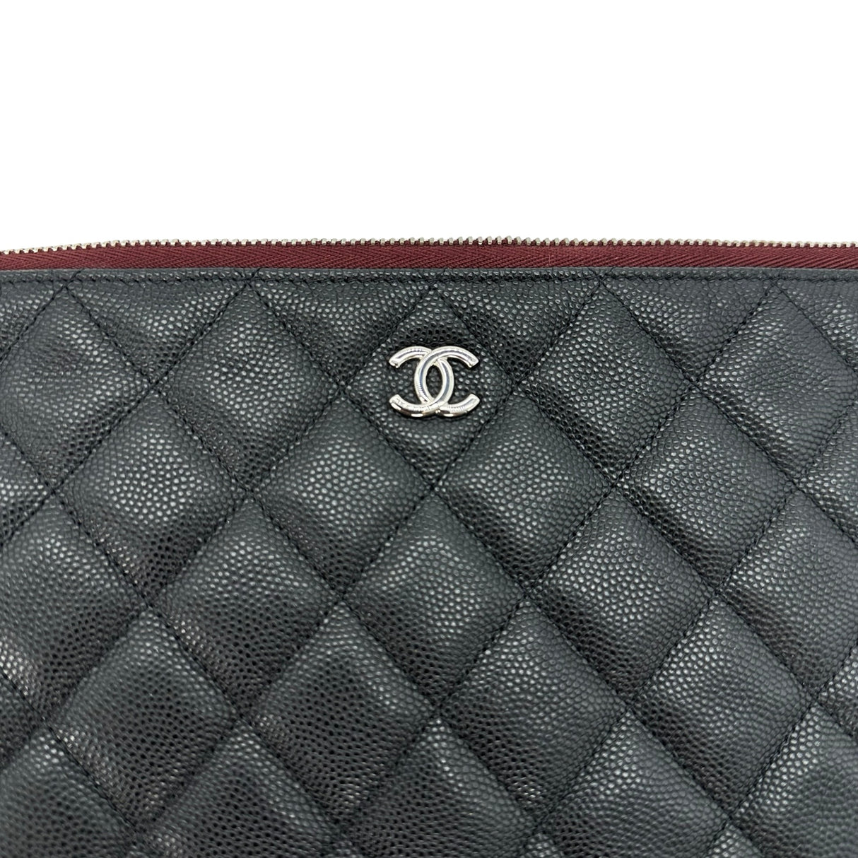 CHANEL: Quilted Caviar Large O Case Zip Pouch