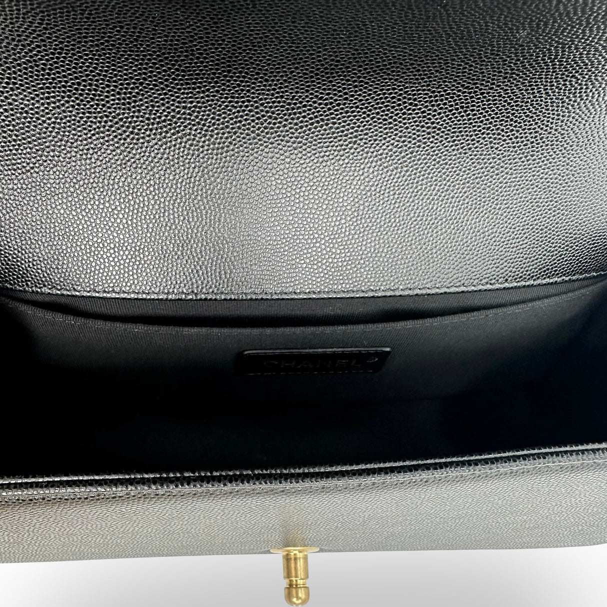 CHANEL: Quilted Caviar Old Medium Boy Bag