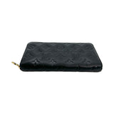 Monogram Embossed Lambskin Coussin Zippy Wallet