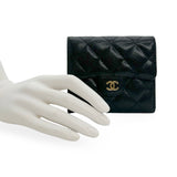 CHANEL: Quilted Caviar Small Classic Flap Wallet