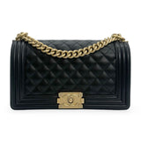 CHANEL: Quilted Caviar Old Medium Boy Bag