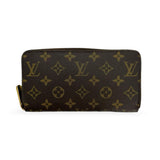 LOUIS VUITTON: Monogram Zippy Wallet
