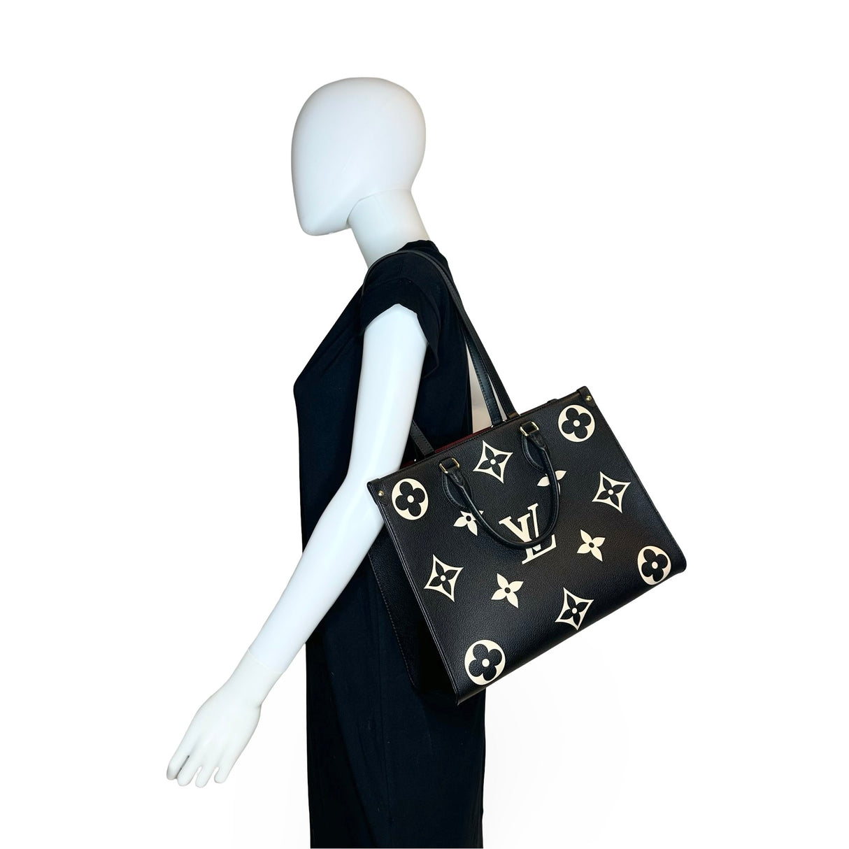 LOUIS VUITTON: Bicolor Monogram Empreinte Onthego MM