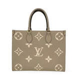 LOUIS VUITTON: Monogram Empreinte Bicolor Onthego MM