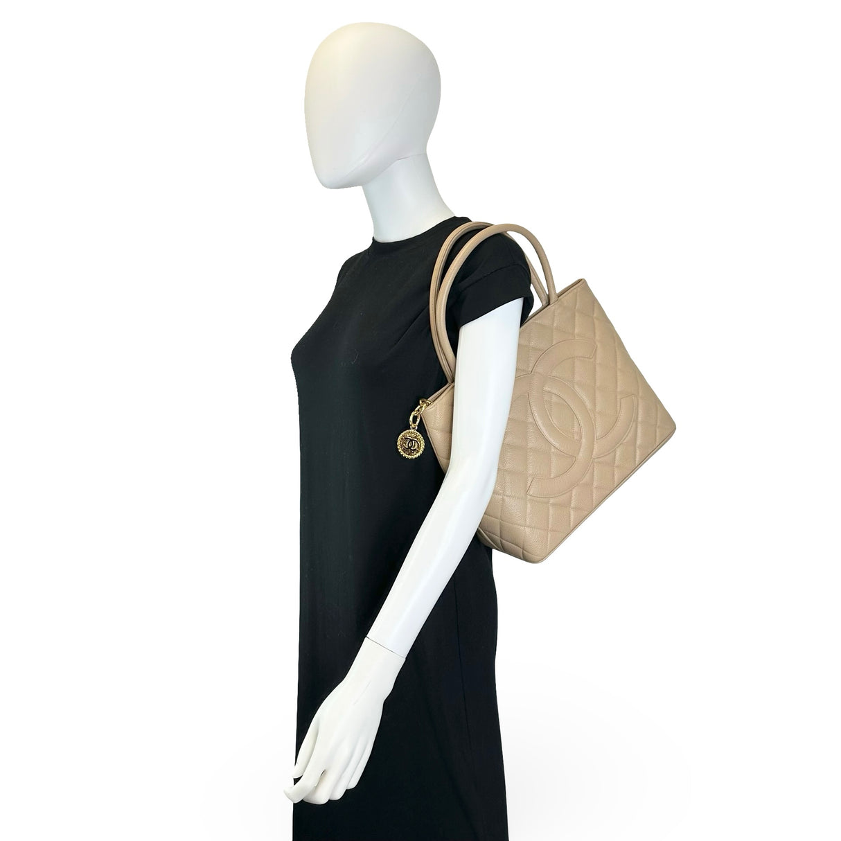 CHANEL: Quilted Caviar CC Medallion Tote