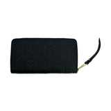 LOUIS VUITTON: Monogram Empreinte Zippy Wallet