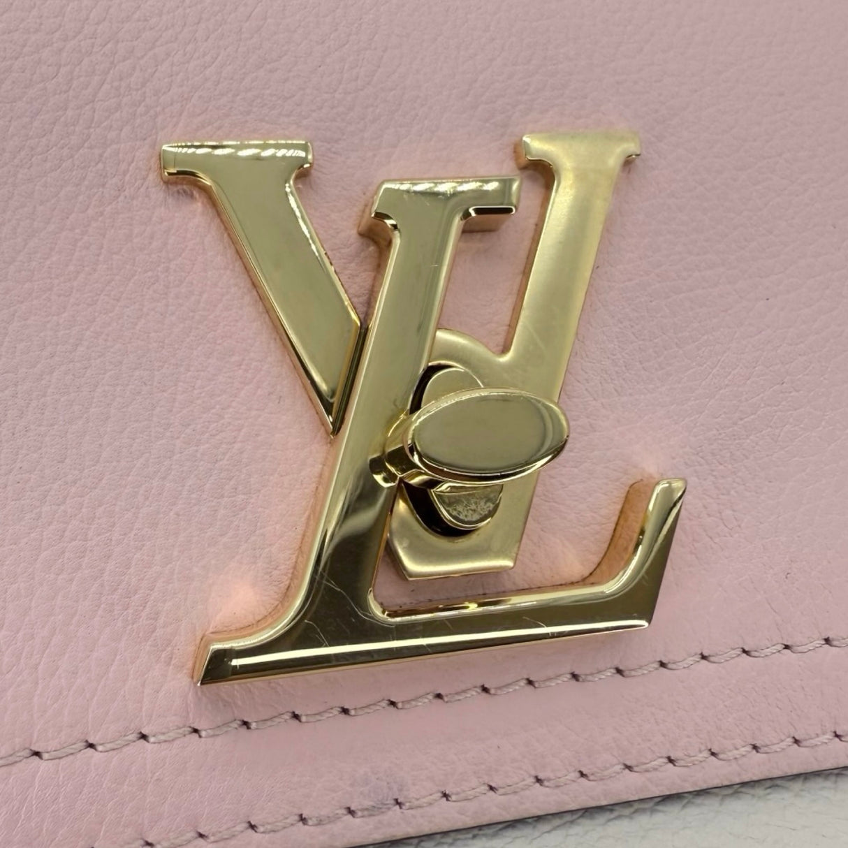 LOUIS VUITTON: Calfskin Lockme Tender