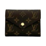 LOUIS VUITTON: Monogram Victorine Wallet