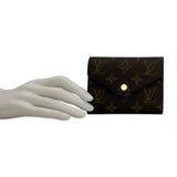 LOUIS VUITTON: Monogram Victorine Wallet