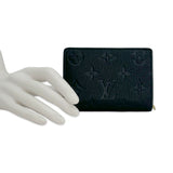 LOUIS VUITTON: Monogram Empreinte Clea Wallet