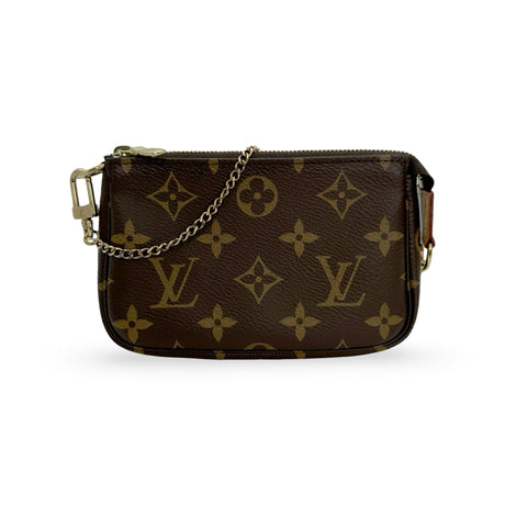 LOUIS VUITTON: Monogram Mini Pochette Accessoires