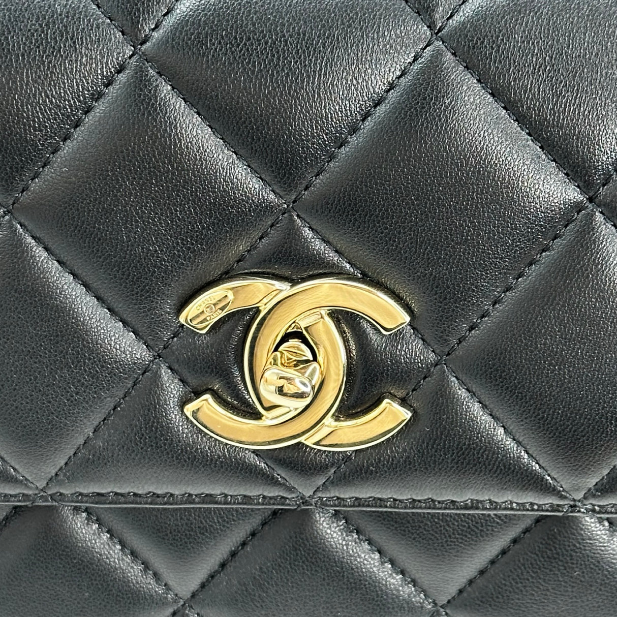 CHANEL: Quilted Lambskin Small Trendy Top Handle Flap Bag