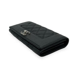 CHANEL: Quilted Caviar Mademoiselle Flap Wallet